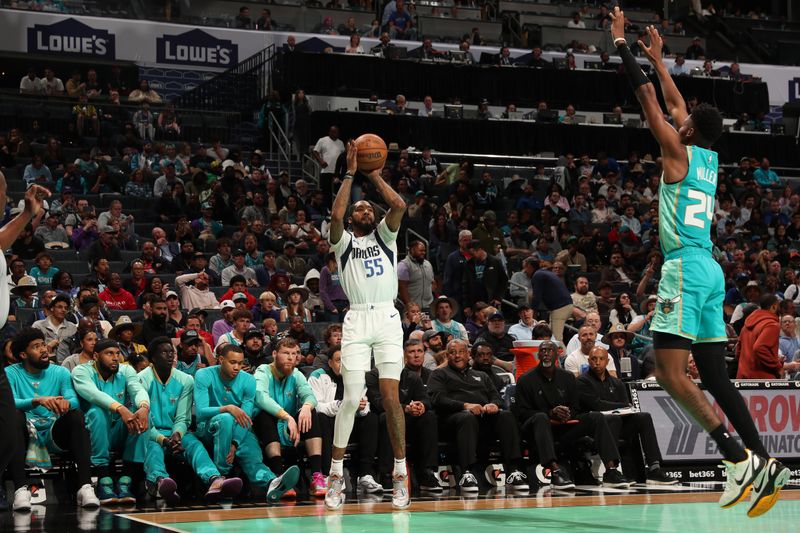 CHARLOTTE, NC - APRIL 9: Derrick Jones Jr. #55 of the Dallas Mavericks shoots a three point basket during the game against the Charlotte Hornets on April 9, 2024 at Spectrum Center in Charlotte, North Carolina. NOTE TO USER: User expressly acknowledges and agrees that, by downloading and or using this photograph, User is consenting to the terms and conditions of the Getty Images License Agreement. Mandatory Copyright Notice: Copyright 2024 NBAE (Photo by Kent Smith/NBAE via Getty Images)