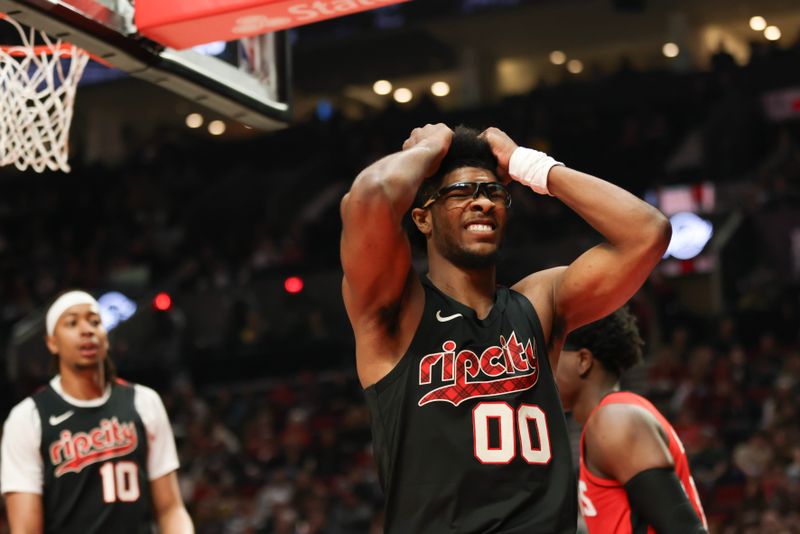 PORTLAND, OREGON - APRIL 12: Scoot Henderson #00 of the Portland Trail Blazers reacts to a call during the third quarter against the Houston Rockets at Moda Center on April 12, 2024 in Portland, Oregon. NOTE TO USER: User expressly acknowledges and agrees that, by downloading and or using this photograph, User is consenting to the terms and conditions of the Getty Images License Agreement.? (Photo by Amanda Loman/Getty Images)