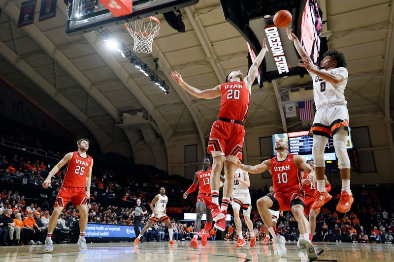 Jan 26, 2023; Corvallis, Oregon, USA; Oregon State Beavers guard Jordan Pope (0) shoots the ball over Utah Utes guard Lazar Stefanovic (20) during the first half at Gill Coliseum. Mandatory Credit: Soobum Im-USA TODAY Sports