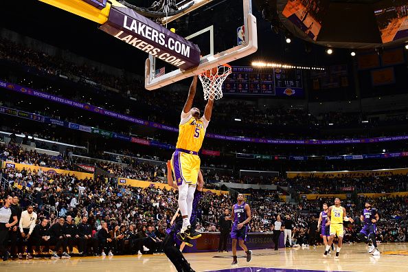 LOS ANGELES, CA - NOVEMBER 15: Cam Reddish #5 of the Los Angeles Lakers dunks the ball during the game against the Sacramento Kings on November 15, 2023 at Crypto.Com Arena in Los Angeles, California. NOTE TO USER: User expressly acknowledges and agrees that, by downloading and/or using this Photograph, user is consenting to the terms and conditions of the Getty Images License Agreement. Mandatory Copyright Notice: Copyright 2023 NBAE (Photo by Adam Pantozzi/NBAE via Getty Images)