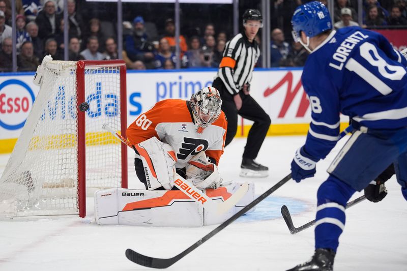 Mar 2, 2026; Toronto, Ontario, CAN; Philadelphia Flyers goaltender Dan Vladar (80) deflects a shot by Toronto Maple Leafs forward Steven Lorentz (18) wide of the net during the first period at Scotiabank Arena. Mandatory Credit: John E. Sokolowski-Imagn Images