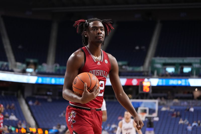 Mar 7, 2023; Greensboro, NC, USA; Louisville Cardinals forward Kamari Lands (22) with the ball in the second half of the first round of the ACC Tournament at Greensboro Coliseum. Mandatory Credit: Bob Donnan-USA TODAY Sports