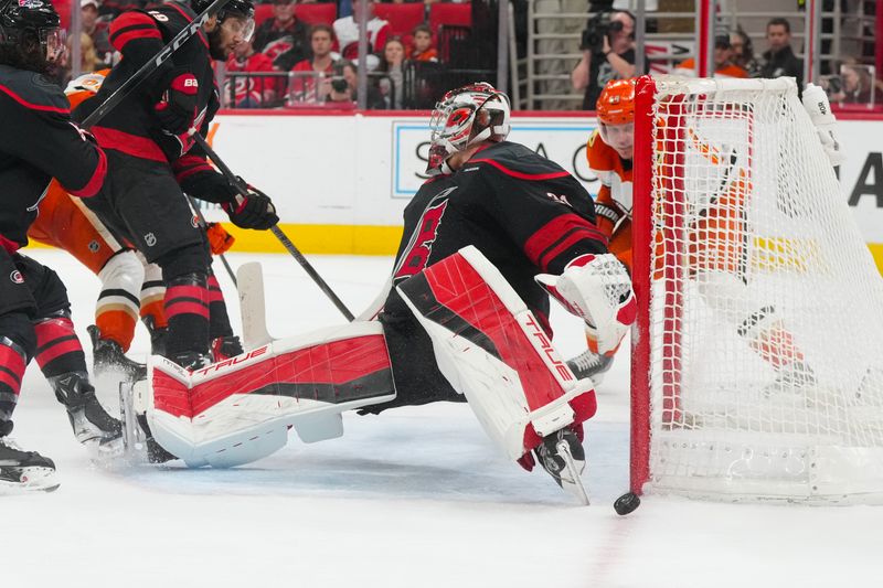 Jan 8, 2026; Raleigh, North Carolina, USA;  Anaheim Ducks center Mikael Granlund (64) missed on his shot attempt against Carolina Hurricanes goaltender Frederik Andersen (31) during the second period at Lenovo Center. Mandatory Credit: James Guillory-Imagn Images