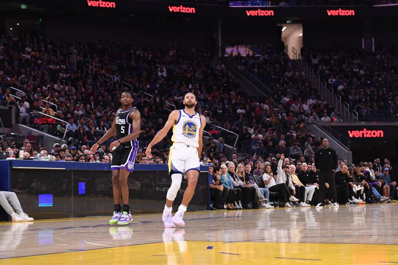 SAN FRANCISCO, CA - OCTOBER 11: Stephen Curry #30 of the Golden State Warriors looks on during the game against the Sacramento Kings during a NBA Preseason game on October 11, 2024 at Chase Center in San Francisco, California. NOTE TO USER: User expressly acknowledges and agrees that, by downloading and or using this photograph, user is consenting to the terms and conditions of Getty Images License Agreement. Mandatory Copyright Notice: Copyright 2024 NBAE (Photo by Noah Graham/NBAE via Getty Images)