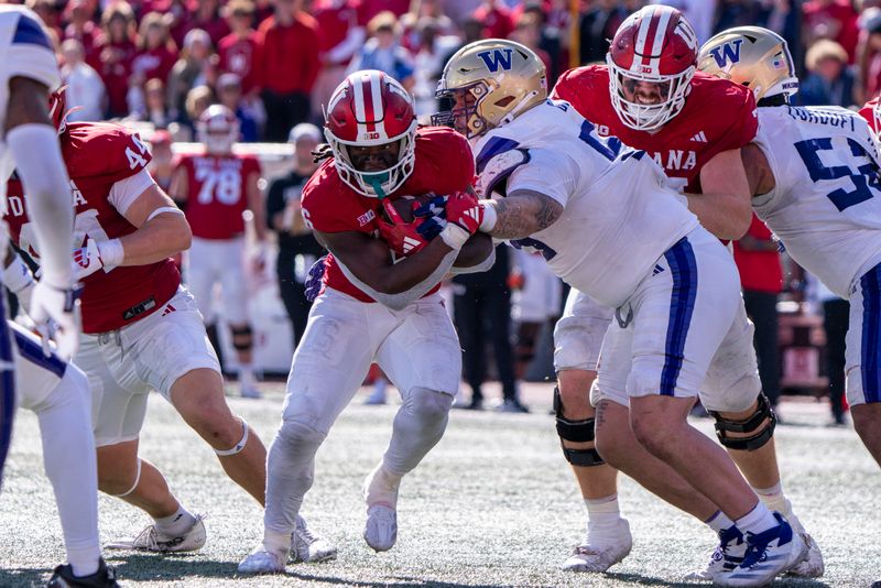 Oct 26, 2024; Bloomington, Indiana, USA; Indiana Hoosiers running back Justice Ellison (6) runs the ball during the fourth quarter against the Washington Huskies at Memorial Stadium. Mandatory Credit: Jacob Musselman-Imagn Images