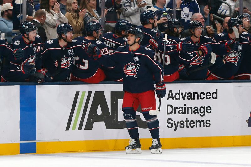 Oct 29, 2025; Columbus, Ohio, USA; Columbus Blue Jackets center Cole Sillinger (4) celebrates his goal against the Toronto Maple Leafs during the first period at Nationwide Arena. Mandatory Credit: Russell LaBounty-Imagn Images