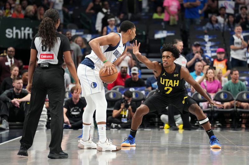 DALLAS, TX - OCTOBER 10: Collin Sexton #2 of the Utah Jazz defends Spencer Dinwiddie #26 of the Dallas Mavericks during the game on October 10, 2024 at American Airlines Center in Dallas, Texas. NOTE TO USER: User expressly acknowledges and agrees that, by downloading and or using this photograph, User is consenting to the terms and conditions of the Getty Images License Agreement. Mandatory Copyright Notice: Copyright 2024 NBAE (Photo by Glenn James/NBAE via Getty Images)