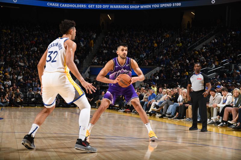 SAN FRANCISCO, CA - APRIL 14:  Omer Yurtseven #77 of the Utah Jazz looks to pass the ball during the game against the Golden State Warriorson April 14, 2024 at Chase Center in San Francisco, California. NOTE TO USER: User expressly acknowledges and agrees that, by downloading and or using this photograph, user is consenting to the terms and conditions of Getty Images License Agreement. Mandatory Copyright Notice: Copyright 2024 NBAE (Photo by Noah Graham/NBAE via Getty Images)