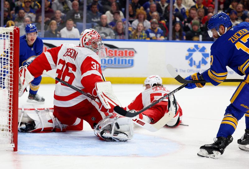 Oct 22, 2025; Buffalo, New York, USA;  Buffalo Sabres center Ryan McLeod (71) scores a goal on Detroit Red Wings goaltender John Gibson (36) during the second period at KeyBank Center. Mandatory Credit: Timothy T. Ludwig-Imagn Images