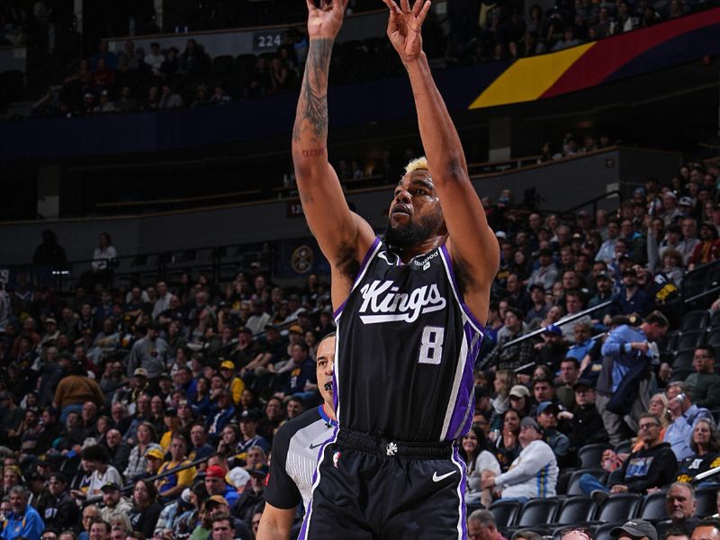 DENVER, CO - FEBRUARY 28: Mason Jones #8 of the Sacramento Kings three point basket during the game against the Denver Nuggets on February 28, 2024 at the Ball Arena in Denver, Colorado. NOTE TO USER: User expressly acknowledges and agrees that, by downloading and/or using this Photograph, user is consenting to the terms and conditions of the Getty Images License Agreement. Mandatory Copyright Notice: Copyright 2024 NBAE (Photo by Garrett Ellwood/NBAE via Getty Images)