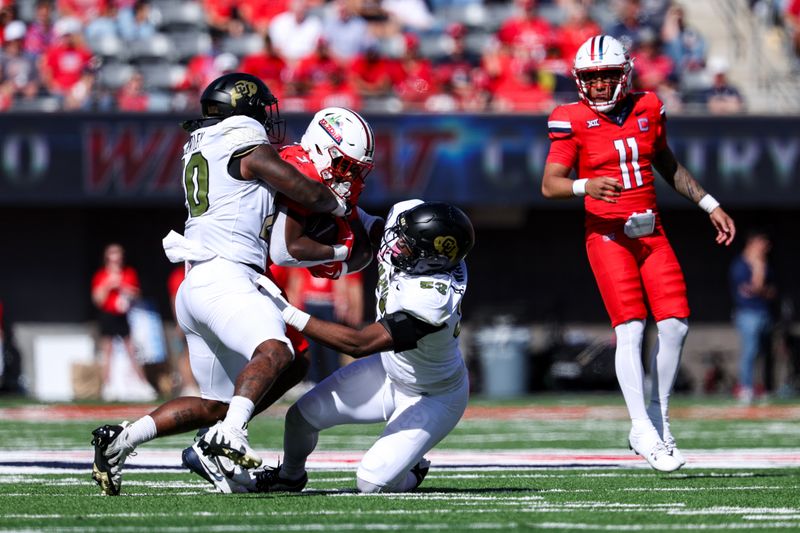Oct 19, 2024; Tucson, Arizona, USA; Colorado Buffaloes inside linebacker LaVonta Bentley (20) tackles Arizona Wildcats running back Kedrick Reescano (3) during the second quarter at Arizona Stadium. Mandatory Credit: Aryanna Frank-Imagn Images
