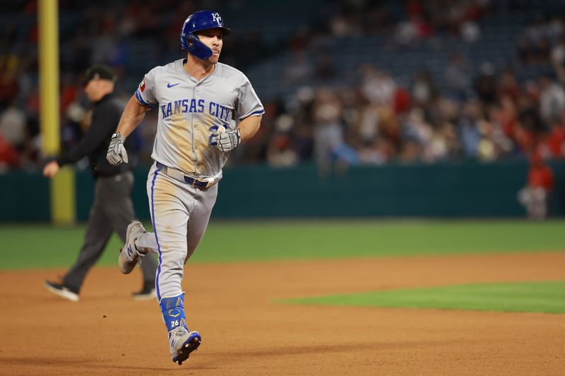 May 10, 2024; Anaheim, California, USA;  Kansas City Royals designated hitter Adam Frazier (26) runs the bases after hitting a two-run home run during the ninth inning against the Los Angeles Angels at Angel Stadium. Mandatory Credit: Kiyoshi Mio-USA TODAY Sports