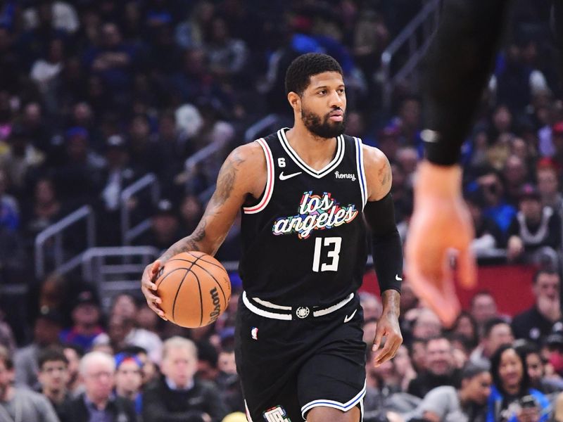 LOS ANGELES, CA - FEBRUARY 10: Paul George #13 of the LA Clippers drives to the basket during the game against the Milwaukee Bucks on February 10, 2023 at Crypto.Com Arena in Los Angeles, California. NOTE TO USER: User expressly acknowledges and agrees that, by downloading and/or using this Photograph, user is consenting to the terms and conditions of the Getty Images License Agreement. Mandatory Copyright Notice: Copyright 2023 NBAE (Photo by Adam Pantozzi/NBAE via Getty Images)