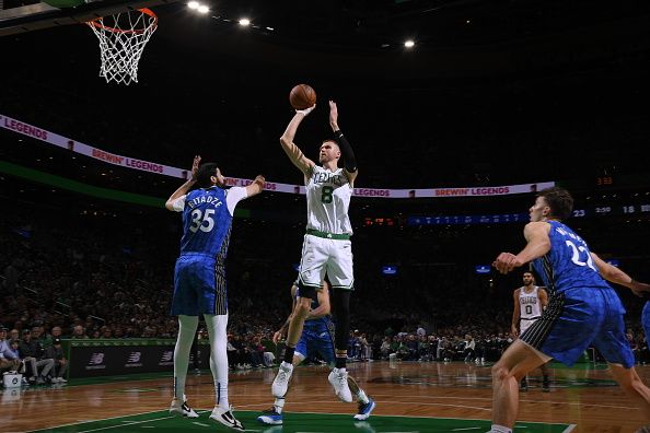 BOSTON, MA - DECEMBER 17: Kristaps Porzingis #8 of the Boston Celtics shoots the ball during the game against the Orlando Magic on December 17, 2023 at the TD Garden in Boston, Massachusetts. NOTE TO USER: User expressly acknowledges and agrees that, by downloading and or using this photograph, User is consenting to the terms and conditions of the Getty Images License Agreement. Mandatory Copyright Notice: Copyright 2023 NBAE  (Photo by Brian Babineau/NBAE via Getty Images)