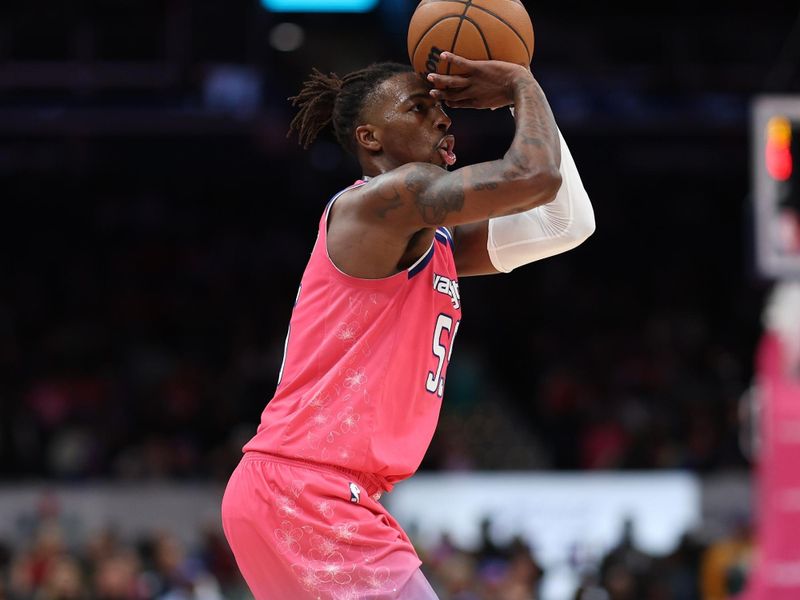 WASHINGTON, DC - MARCH 24: Delon Wright #55 of the Washington Wizards shoots against the San Antonio Spurs during the second half at Capital One Arena on March 24, 2023 in Washington, DC. NOTE TO USER: User expressly acknowledges and agrees that, by downloading and or using this photograph, User is consenting to the terms and conditions of the Getty Images License Agreement.  (Photo by Patrick Smith/Getty Images)