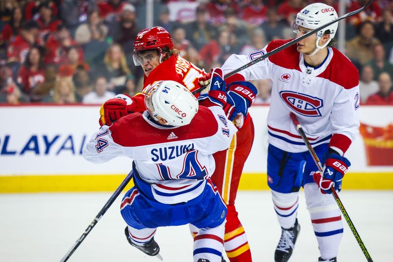 Mar 16, 2024; Calgary, Alberta, CAN; Calgary Flames center Martin Pospisil (76) and Montreal Canadiens center Nick Suzuki (14) gets into a scrum during the second period at Scotiabank Saddledome. Mandatory Credit: Sergei Belski-USA TODAY Sports