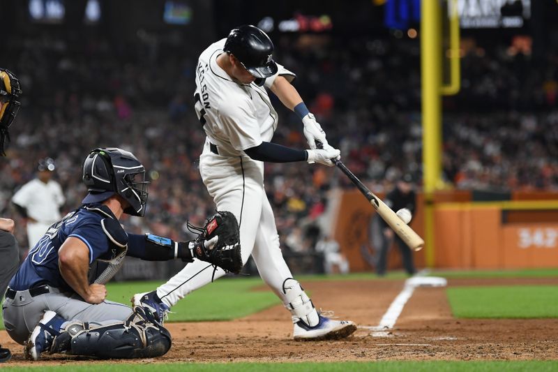 Sep 25, 2024; Detroit, Michigan, USA;  Detroit Tigers first baseman Spencer Torkelson (20) hits a two-run home run against the Tampa Bay Rays in the sixth inning at Comerica Park. Mandatory Credit: Lon Horwedel-Imagn Images