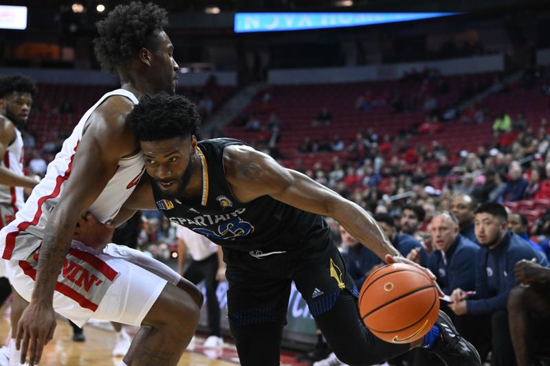 Feb 14, 2023; Las Vegas, Nevada, USA; San Jose State Spartans forward Sage Tolbert III (23) collides with UNLV Runnin' Rebels guard Shane Nowell (3) in the second half at Thomas & Mack Center. Mandatory Credit: Candice Ward-USA TODAY Sports