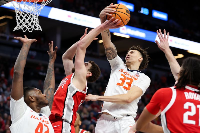 Mar 15, 2024; Minneapolis, MN, USA; Illinois Fighting Illini forward Coleman Hawkins (33) blocks a shot by Illinois Fighting Illini guard Luke Goode (10) during the second half at Target Center. Mandatory Credit: Matt Krohn-USA TODAY Sports