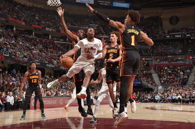 CLEVELAND, OH - NOVEMBER 27: Darius Garland #10 of the Cleveland Cavaliers drives to the basket during the game against the Atlanta Hawks on November 27, 2024 at Rocket Mortgage FieldHouse in Cleveland, Ohio. NOTE TO USER: User expressly acknowledges and agrees that, by downloading and/or using this Photograph, user is consenting to the terms and conditions of the Getty Images License Agreement. Mandatory Copyright Notice: Copyright 2024 NBAE (Photo by David Liam Kyle/NBAE via Getty Images)