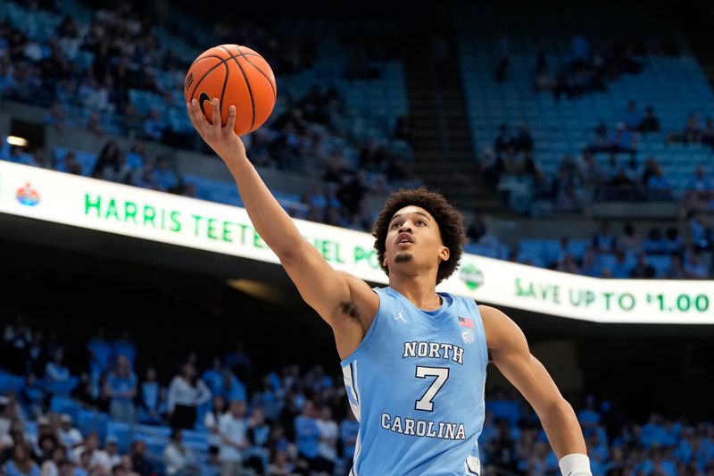 Nov 17, 2023; Chapel Hill, North Carolina, USA; North Carolina Tar Heels guard Seth Trimble (7) shoots in the second half at Dean E. Smith Center. Mandatory Credit: Bob Donnan-USA TODAY Sports