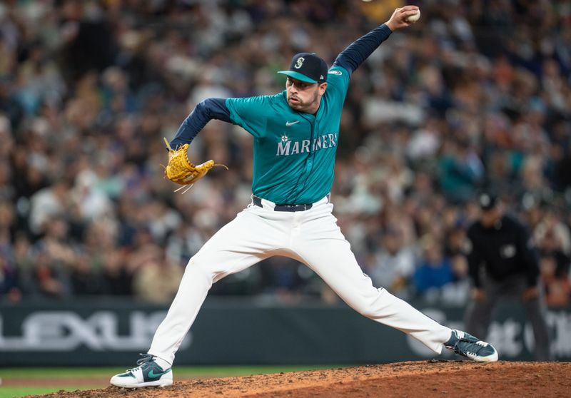 Aug 23, 2024; Seattle, Washington, USA; Seattle Mariners reliever Tayler Saucedo (60) delivers a pitch during the ninth inning against the San Francisco Giants at T-Mobile Park. Mandatory Credit: Stephen Brashear-USA TODAY Sports