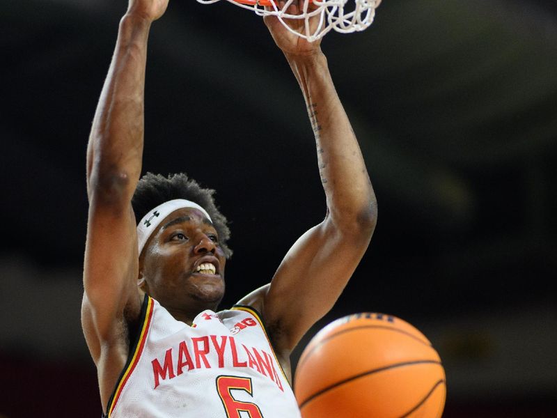 Dec 4, 2024; College Park, Maryland, USA; Maryland Terrapins forward Tafara Gapare (6) dunks the ball during the second half against the Ohio State Buckeyes at Xfinity Center. Mandatory Credit: Reggie Hildred-Imagn Images