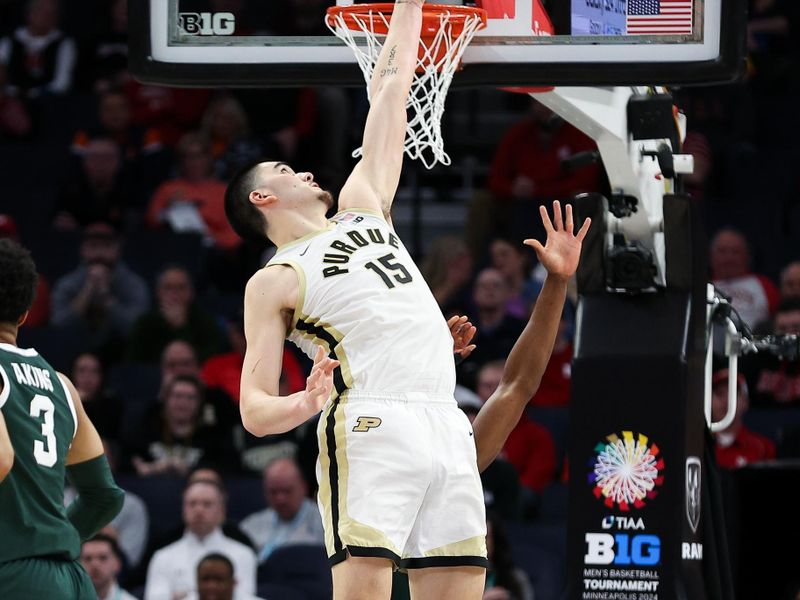 Mar 15, 2024; Minneapolis, MN, USA; Purdue Boilermakers center Zach Edey (15) catches a pass against the Michigan State Spartans during the second half at Target Center. Mandatory Credit: Matt Krohn-USA TODAY Sports