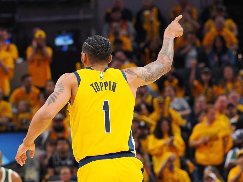 INDIANAPOLIS, IN - APRIL 26:  Obi Toppin #1 of the Indiana Pacers reacts against the Milwaukee Bucks during Round 1 Game 3 of the 2024 NBA Playoffs on April 26, 2024 at Gainbridge Fieldhouse in Indianapolis, Indiana. NOTE TO USER: User expressly acknowledges and agrees that, by downloading and or using this Photograph, user is consenting to the terms and conditions of the Getty Images License Agreement. Mandatory Copyright Notice: Copyright 2024 NBAE (Photo by Ron Hoskins/NBAE via Getty Images)