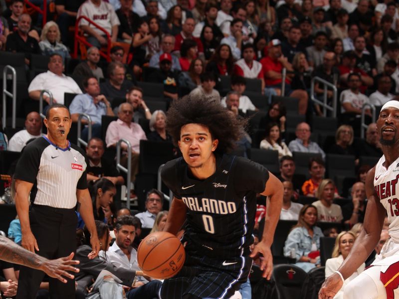 MIAMI, FL - OCTOBER 23: Anthony Black #0 of the Orlando Magic drives to the basket during the game against the Miami Heat on October 23, 2024 at Kaseya Center in Miami, Florida. NOTE TO USER: User expressly acknowledges and agrees that, by downloading and or using this Photograph, user is consenting to the terms and conditions of the Getty Images License Agreement. Mandatory Copyright Notice: Copyright 2024 NBAE (Photo by Issac Baldizon/NBAE via Getty Images)