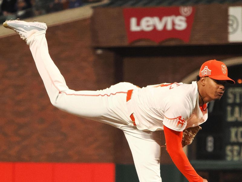 May 14, 2024; San Francisco, California, USA; San Francisco Giants relief pitcher Randy Rodriguez (73) pitches against the Los Angeles Dodgers during the seventh inning at Oracle Park. Mandatory Credit: Kelley L Cox-USA TODAY Sports