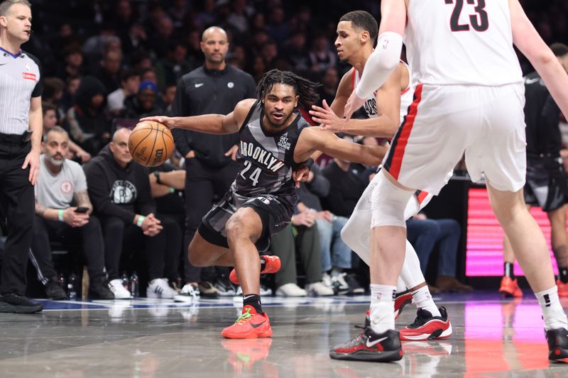 BROOKLYN, NY - FEBRUARY 28:  Cam Thomas #24 of the Brooklyn Nets dribbles the ball during the game against the Portland Trail Blazers  on February 28, 2025 at Barclays Center in Brooklyn, New York. NOTE TO USER: User expressly acknowledges and agrees that, by downloading and or using this Photograph, user is consenting to the terms and conditions of the Getty Images License Agreement. Mandatory Copyright Notice: Copyright 2025 NBAE (Photo by Brandon Todd/NBAE via Getty Images)