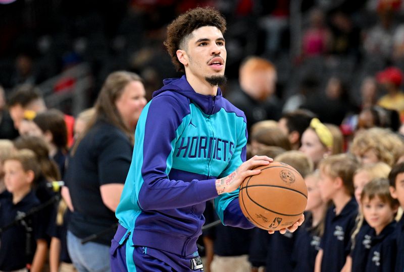 ATLANTA, GEORGIA - OCTOBER 25: LaMelo Ball #1 of Charlotte Hornets warms up prior to a game against the Atlanta Hawks at State Farm Arena on October 25, 2024 in Atlanta, Georgia. NOTE TO USER: User expressly acknowledges and agrees that, by downloading and or using this photograph, User is consenting to the terms and conditions of the Getty Images License Agreement. (Photo by Paras Griffin/Getty Images)