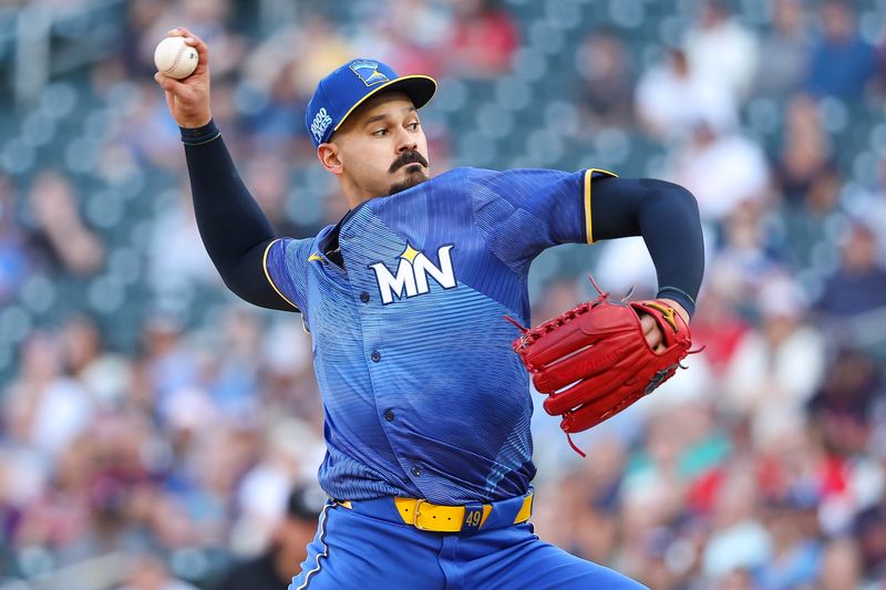 Jul 5, 2024; Minneapolis, Minnesota, USA; Minnesota Twins starting pitcher Pablo Lopez (49) delivers a pitch against the Houston Astros during the first inning at Target Field. Mandatory Credit: Matt Krohn-USA TODAY Sports