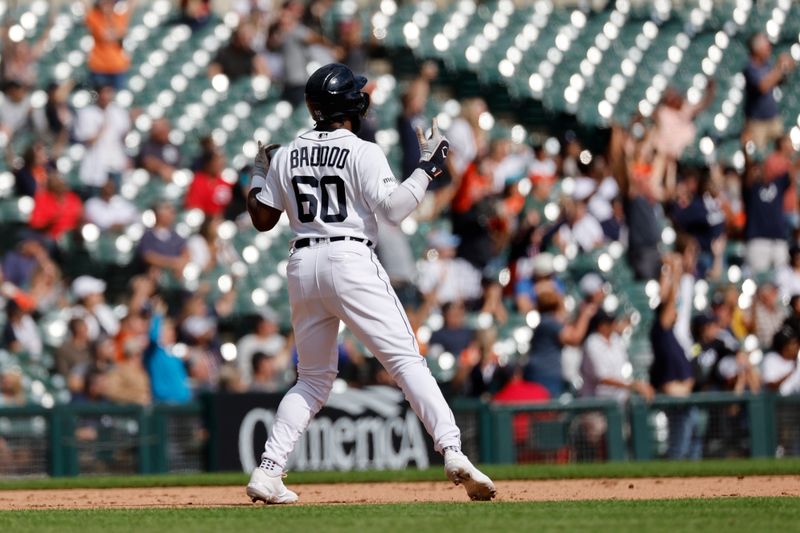 Sep 14, 2023; Detroit, Michigan, USA; Detroit Tigers left fielder Akil Baddoo (60) celebrates a grand slam hit by right fielder Matt Vierling (8) in the eighth inning against the Cincinnati Reds at Comerica Park. Mandatory Credit: Rick Osentoski-USA TODAY Sports