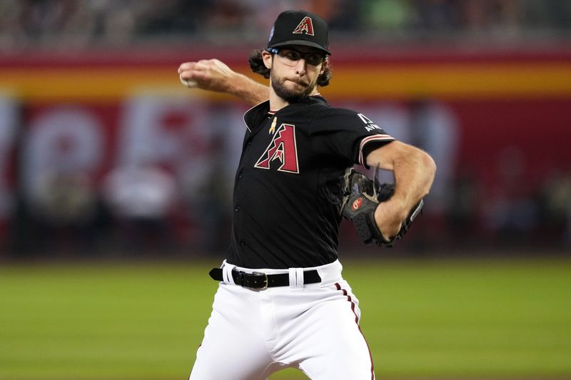 Sep 3, 2023; Phoenix, Arizona, USA; Arizona Diamondbacks starting pitcher Zac Gallen (23) pitches against the Baltimore Orioles during the third inning at Chase Field. Mandatory Credit: Joe Camporeale-USA TODAY Sports