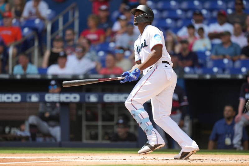 Apr 5, 2023; Miami, Florida, USA;  Miami Marlins left fielder Jorge Soler (12) hits a home run against the Minnesota Twins in the first inning at loanDepot Park. Mandatory Credit: Jim Rassol-USA TODAY Sports