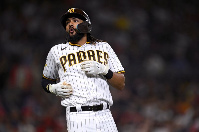 Sep 5, 2023; San Diego, California, USA; San Diego Padres right fielder Fernando Tatis Jr. (23) reacts after a foul ball against the Philadelphia Phillies during the sixth inning at Petco Park. Mandatory Credit: Orlando Ramirez-USA TODAY Sports