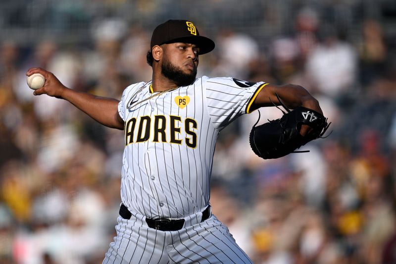 Apr 20, 2024; San Diego, California, USA; San Diego Padres starting pitcher Randy Vasquez (98) throws a pitch against the Toronto Blue Jays during the first inning at Petco Park. Mandatory Credit: Orlando Ramirez-USA TODAY Sports