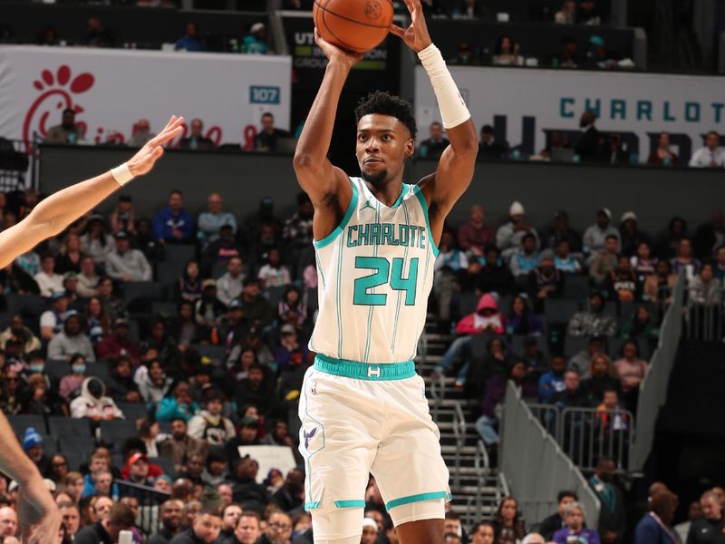 CHARLOTTE, NC - JANUARY 7: Brandon Miller #24 of the Charlotte Hornets shoots a three point basket during the game against the Phoenix Suns on January 7, 2025 at Spectrum Center in Charlotte, North Carolina. NOTE TO USER: User expressly acknowledges and agrees that, by downloading and or using this photograph, User is consenting to the terms and conditions of the Getty Images License Agreement. Mandatory Copyright Notice: Copyright 2025 NBAE (Photo by Kent Smith/NBAE via Getty Images)