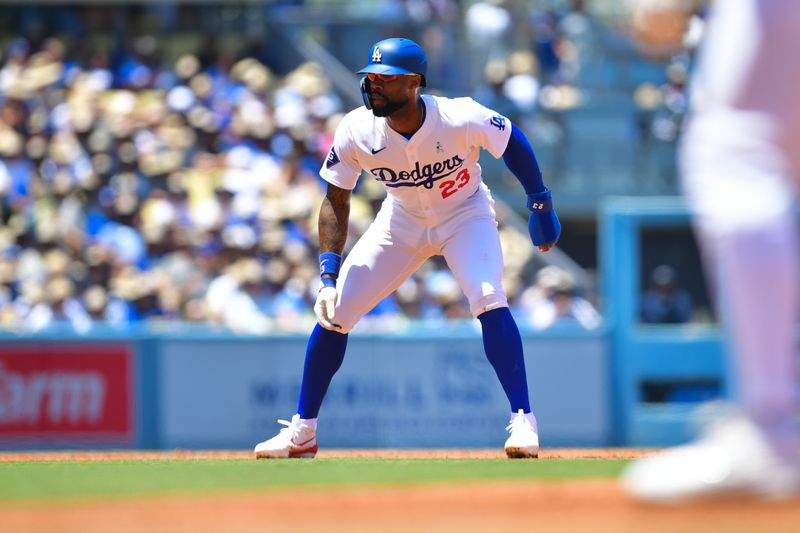 Jun 16, 2024; Los Angeles, California, USA; Los Angeles Dodgers right fielder Jason Heyward (23) leads off from second against the Kansas City Royals during the second inning at Dodger Stadium. Mandatory Credit: Gary A. Vasquez-USA TODAY Sports