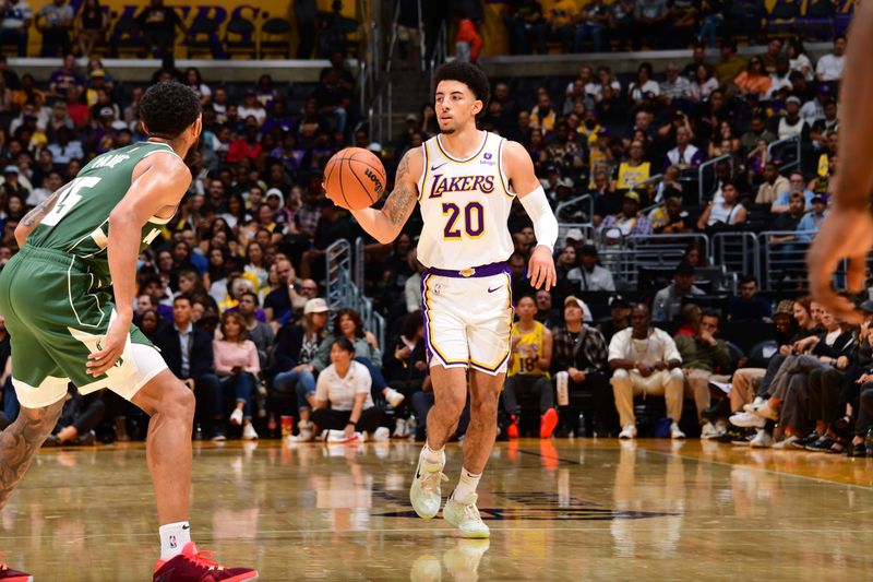 LOS ANGELES, CA - OCTOBER 15: Scotty Pippen Jr. #20 of the Los Angeles Lakers dribbles the ball during the game against the Milwaukee Bucks on October 15, 2023 at Crypto.Com Arena in Los Angeles, California. NOTE TO USER: User expressly acknowledges and agrees that, by downloading and/or using this Photograph, user is consenting to the terms and conditions of the Getty Images License Agreement. Mandatory Copyright Notice: Copyright 2023 NBAE (Photo by Adam Pantozzi/NBAE via Getty Images)