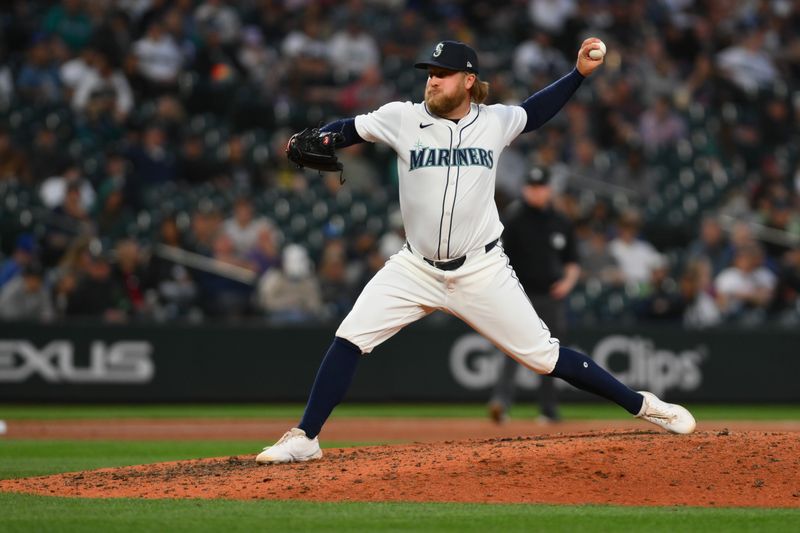 May 14, 2024; Seattle, Washington, USA; Seattle Mariners relief pitcher Kirby Snead (43) pitches to the Kansas City Royals during the eighth inning at T-Mobile Park. Mandatory Credit: Steven Bisig-USA TODAY Sports