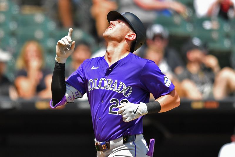 Jun 29, 2024; Chicago, Illinois, USA; Colorado Rockies left fielder Nolan Jones (22) celebrates his two-run home run during the fifth inning against the Chicago White Sox at Guaranteed Rate Field. Mandatory Credit: Patrick Gorski-USA TODAY Sports