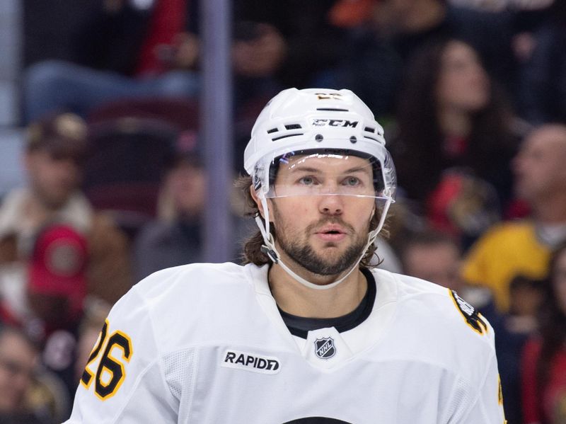 Oct 27, 2025; Ottawa, Ontario, CAN; Boston Bruins defenseman Andrew Peeke (26) skates in the first period against the Ottawa Senators at the Canadian Tire Centre. Mandatory Credit: Marc DesRosiers-IMAGN Images