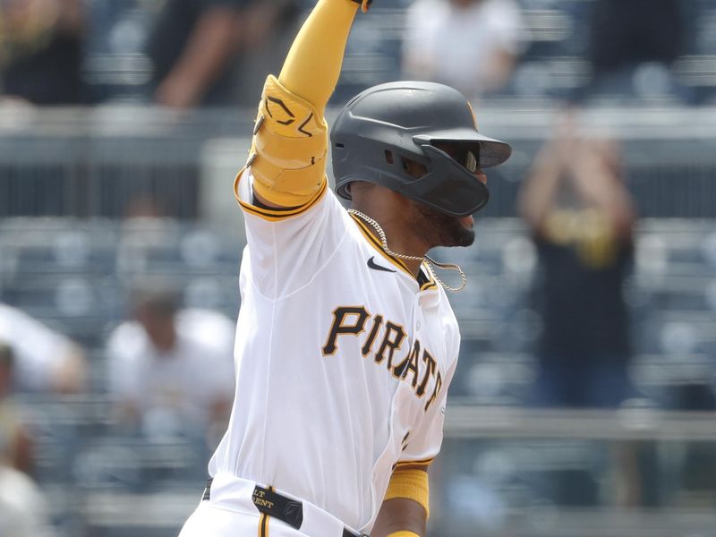 Jul 8, 2024; Pittsburgh, Pennsylvania, USA;  Pittsburgh Pirates right fielder Joshua Palacios (77) gestures as he runs the bases after hitting a solo home run against the New York Mets during the sixth inning at PNC Park. The Pirates won 8-2. Mandatory Credit: Charles LeClaire-USA TODAY Sports
