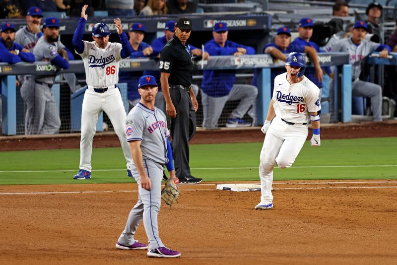 Oct 20, 2024; Los Angeles, California, USA; Los Angeles Dodgers catcher Will Smith (16) celebrates after hitting a two run home run during the third inning against the New York Mets during game six of the NLCS for the 2024 MLB playoffs at Dodger Stadium. Mandatory Credit: Jason Parkhurst-Imagn Images