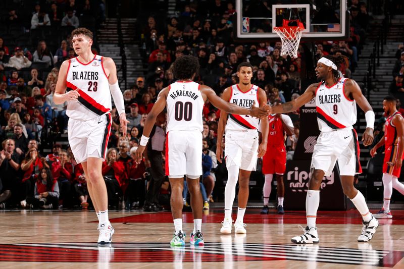 PORTLAND, OR - OCTOBER 27: Scoot Henderson #00 of the Portland Trail Blazers high fives Jerami Grant #9 during the game against the New Orleans Pelicans on October 27, 2024 at the Moda Center Arena in Portland, Oregon. NOTE TO USER: User expressly acknowledges and agrees that, by downloading and or using this photograph, user is consenting to the terms and conditions of the Getty Images License Agreement. Mandatory Copyright Notice: Copyright 2024 NBAE (Photo by Cameron Browne/NBAE via Getty Images)