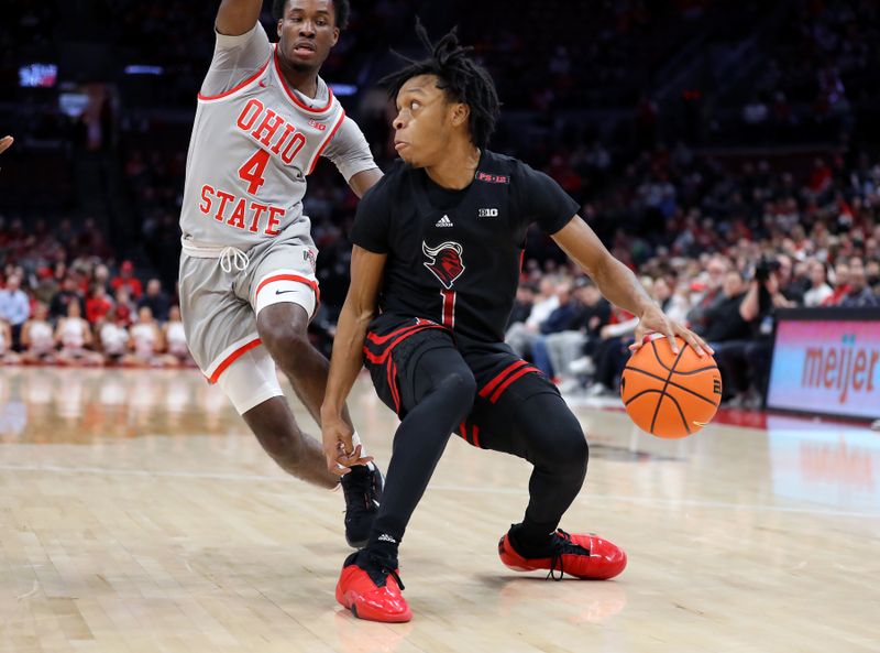 Jan 3, 2024; Columbus, Ohio, USA; Rutgers Scarlet Knights guard Jamichael Davis (1) controls the ball as Ohio State Buckeyes guard Dale Bonner (4) defends during the first half at Value City Arena. Mandatory Credit: Joseph Maiorana-USA TODAY Sports