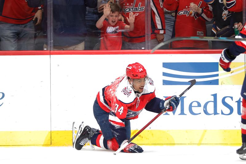 Mar 22, 2026; Washington, District of Columbia, USA; Washington Capitals center Justin Sourdif (34) celebrates after scoring a goal against the Colorado Avalanche during the first period at Capital One Arena. Mandatory Credit: Amber Searls-Imagn Images